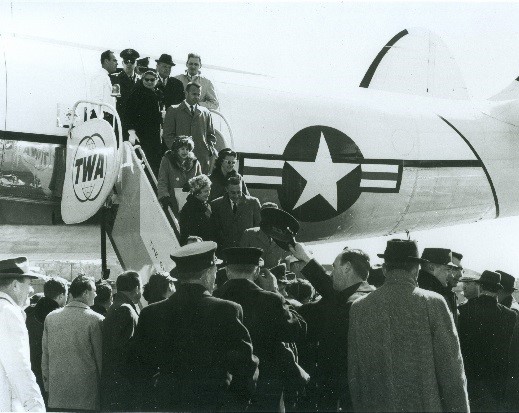 crowd outside airplane